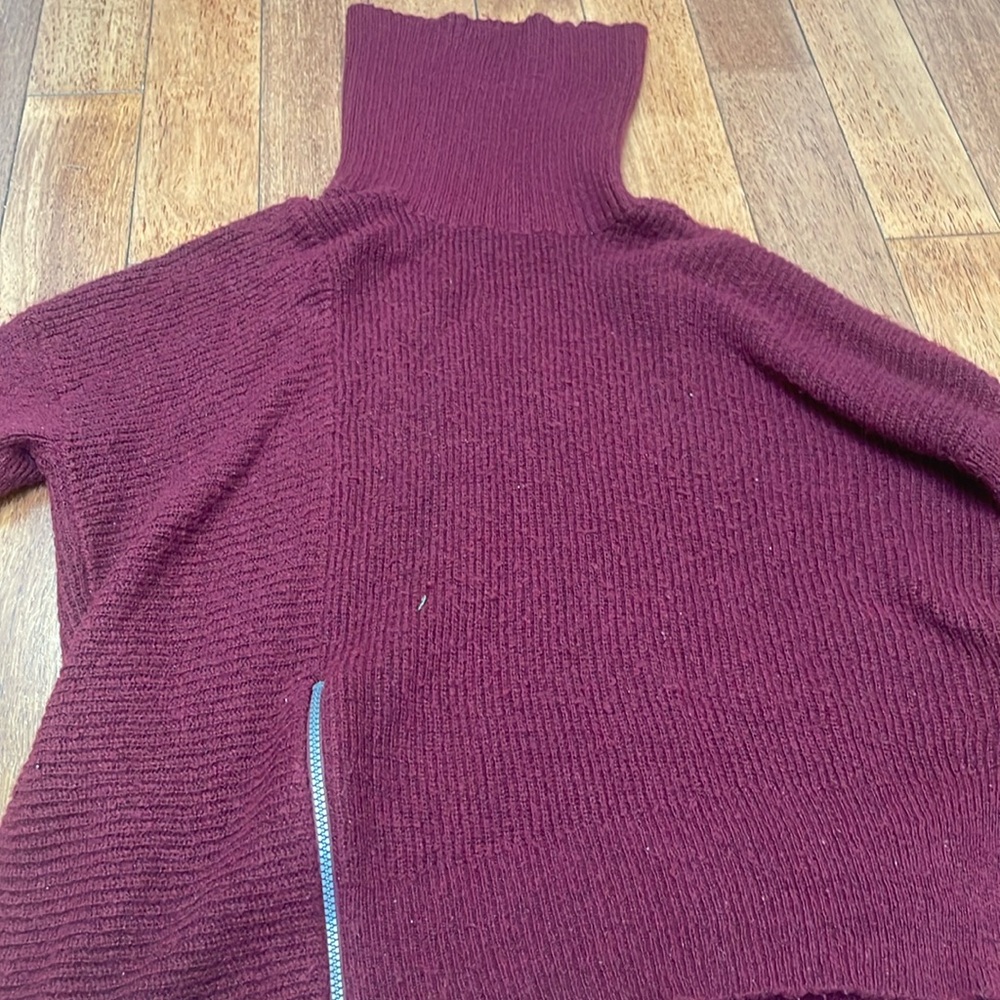 Knit red turtleneck sweater